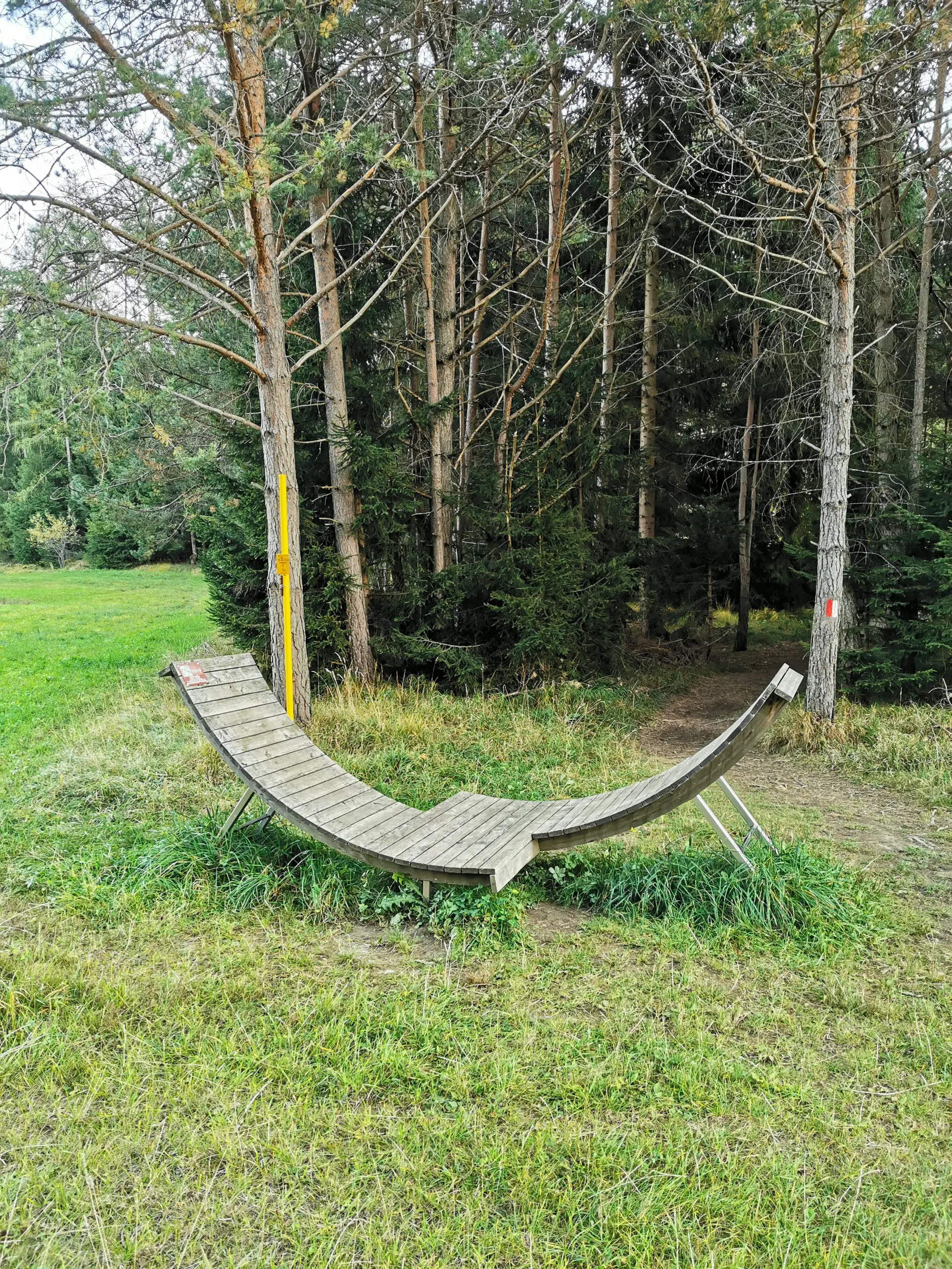 Small playground and sitting bench